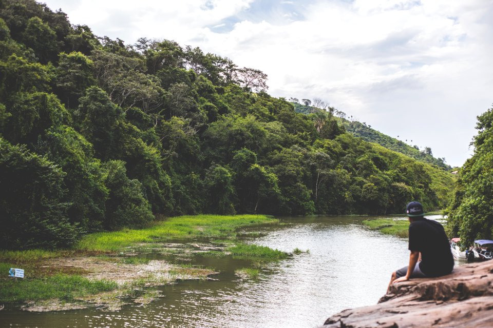 Man Watching River