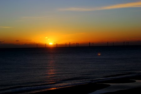 Windfarm Silhouette At Sunset photo