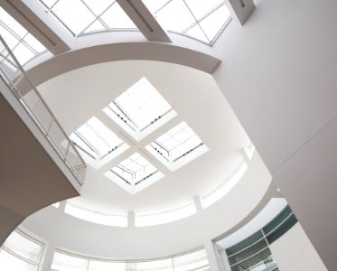White Painted Ceiling With Glass Roof During Day Time photo