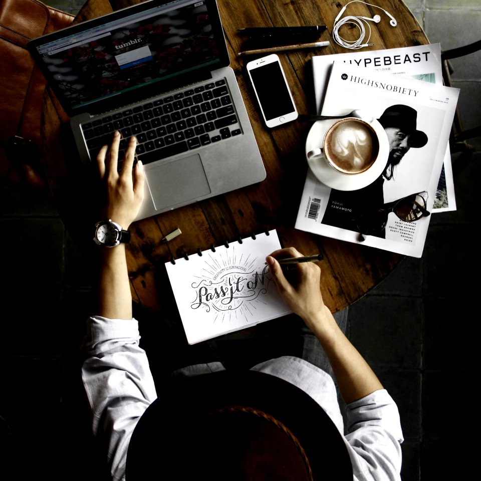 Calligraphy Artist Using Laptop