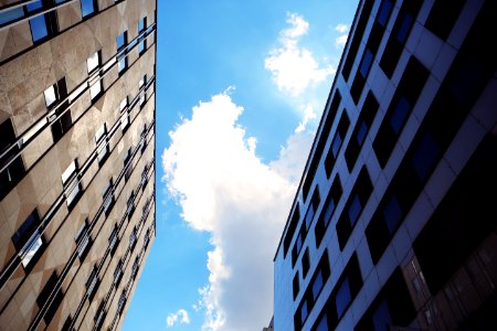 High Rise Buildings Against Blue Skies photo