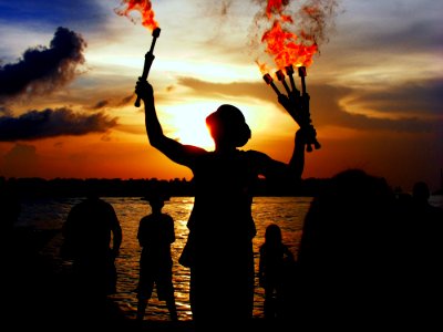 People Near Beach During Night Time