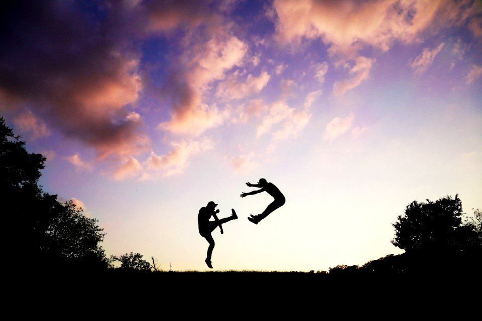 2 People Doing Karate During Sunset