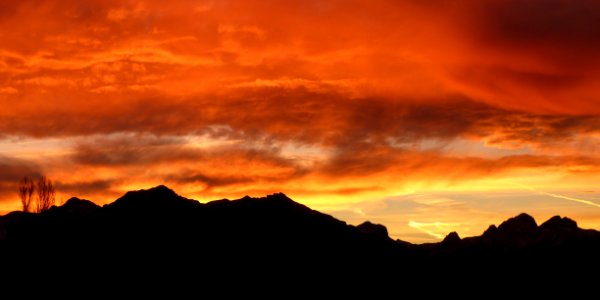 Dramatic Orange Sunrise Over Mountains