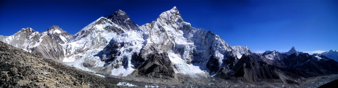 Mountain Filled With Snow Under Blue Sky During Daytime