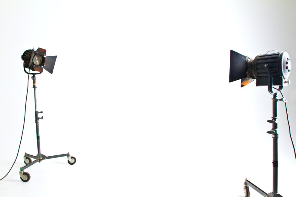 2 Black And Brown Studio Lighting In White Room