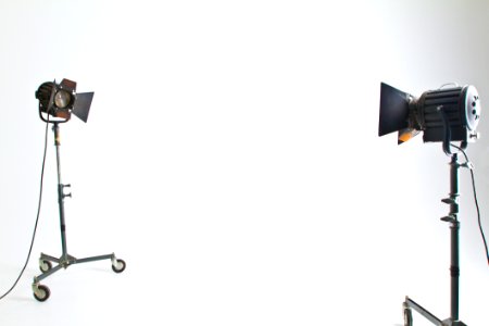 2 Black And Brown Studio Lighting In White Room