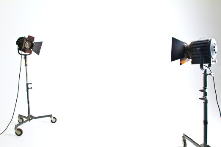 2 Black And Brown Studio Lighting In White Room photo