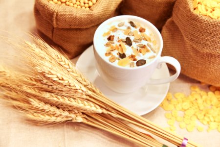 Cup Of Coffee Decorated With Cereal photo