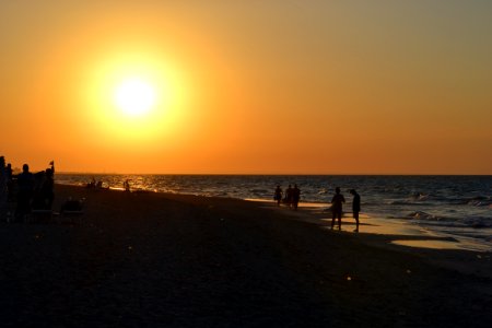 Sun Setting Over Beach photo