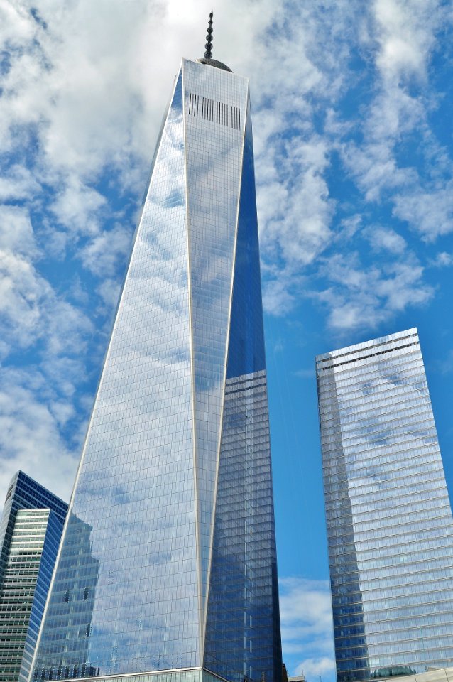 Curtain Wall Buildings Under Blue Cloudy Sky photo