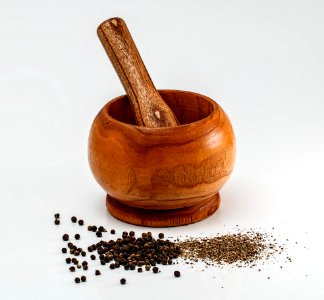Brown Wooden Mortar Teasle photo