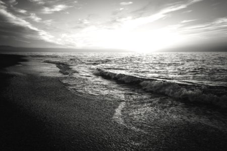 Waves On Beach In Black And White photo