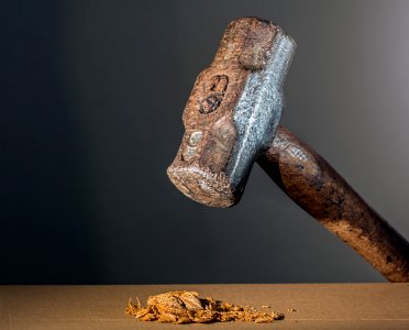 Hammer Crushing Nuts photo