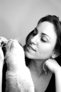 Grayscale Photo Of Woman And Cat photo