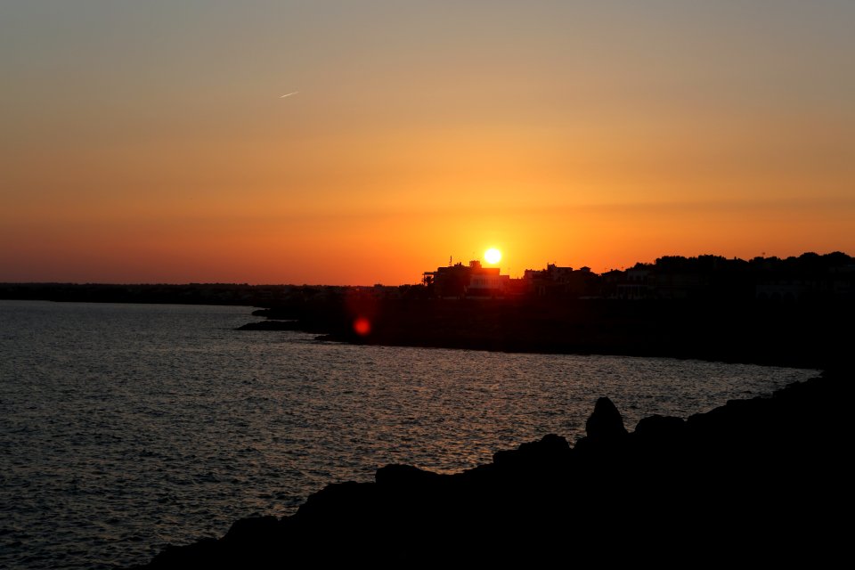 Sun Set Over Rocky Coastline photo