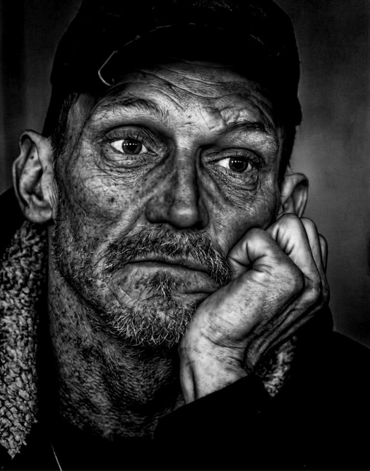 Man In Black Cap Grayscale Photo