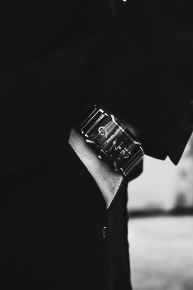 Close-up View Of Man Wearing Black Watch