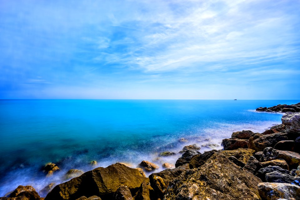 Sea Waves Splash On Rock Mountain