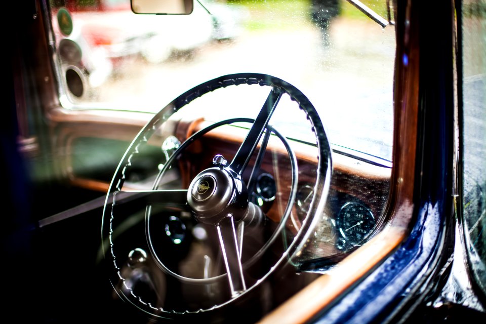 Grey Car Steering Wheel During Daytime