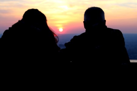 Two Silhouette Person Watching The Sunset