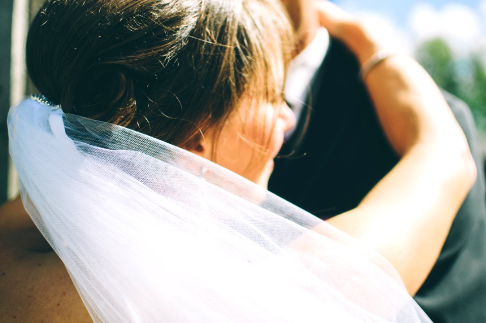 Bride Dancing With Groom In Black Suit Jacket