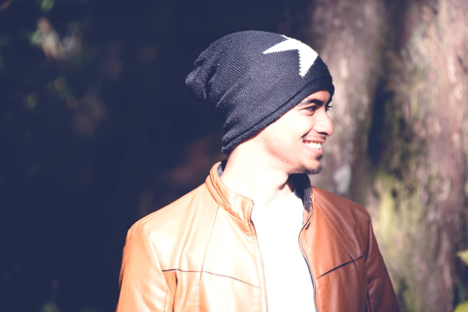 Outdoor Portrait Of Man In Cap photo