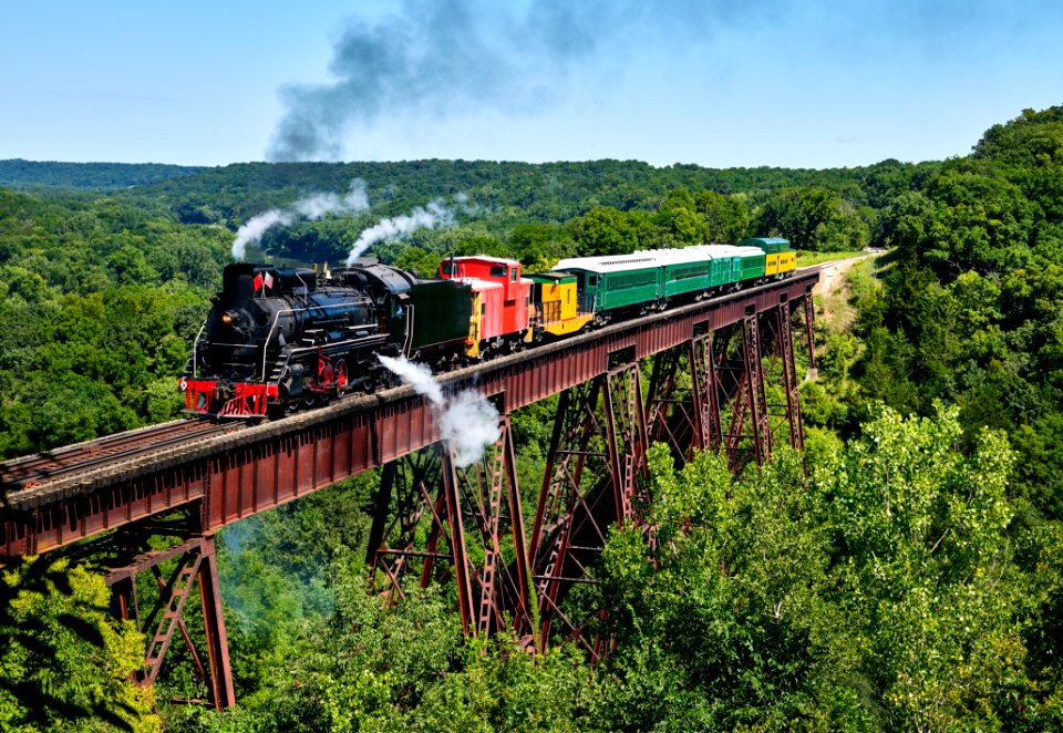 A steam train crosses the 156-foot-tall Bass Point Creek Bridge. Original image from Carol M. Highsmith’s America, Library of Congress collection.