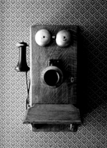 An old-style crank telepone inside a prairie "I house," part of the Ackley Heritage Center. Original image from Carol M. Highsmith’s America, Library of Congress collection.