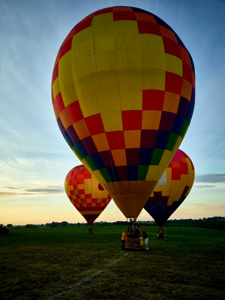 As dusk approaches, balloons land at the National Balloon Classic, a hot air balloon exhibition in Indianola, Iowa, a town near the state capital of Des Moines. Original image from Carol M. Highsmith’s America, Library of Congress collection.