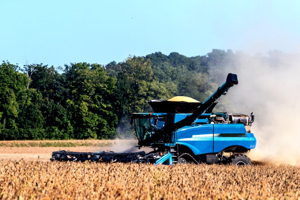 A harvester kicks up dust in a cornfield near Bridgeton in Parke County, Indiana. Original image from Carol M. Highsmith’s America, Library of Congress collection.