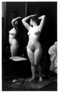 Young woman modeling: full length nude looking in mirror (1902) by Fitz W. Guerin.