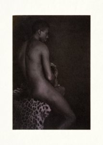 Nude photography of naked woman: Nude youth on leopard skin (1897) by Fred Holland. photo