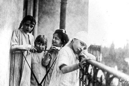 On the balcony at Evian ARC hospital. Anaemic children from Paris dispensary (1918).