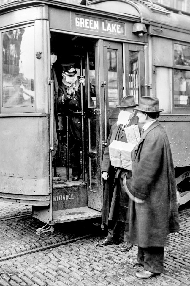 Precaution during the Spanish Influenza Epidemic would not permit anyone to ride on the street cars without wearing a mask, Seattle, Washington (ca.1918).