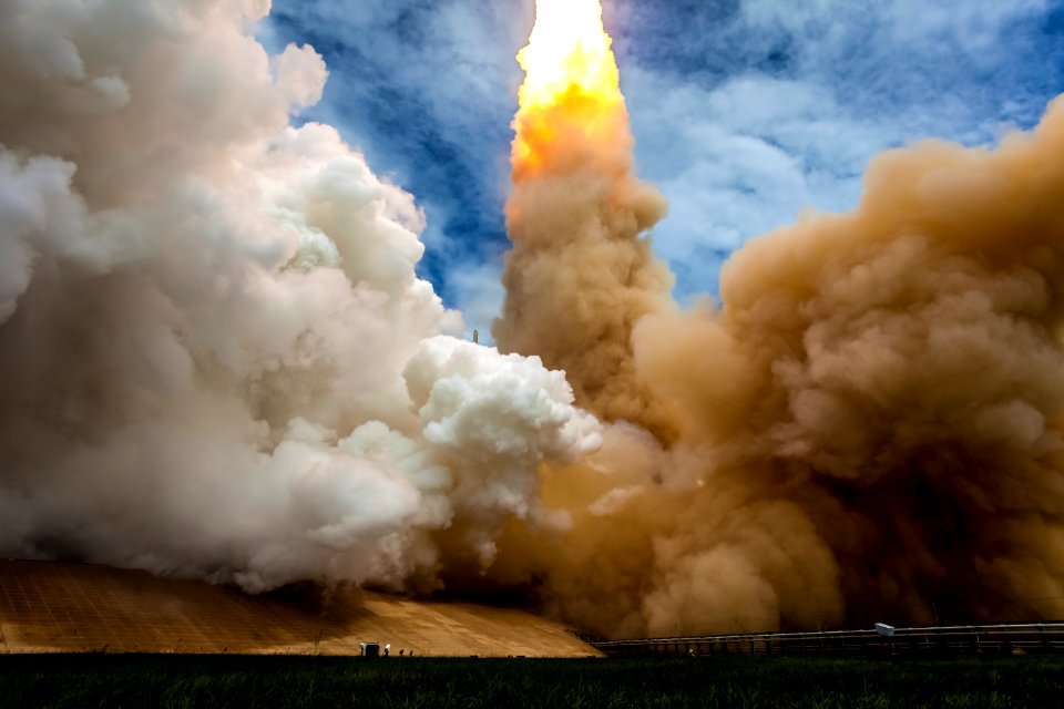 The exhaust plume from space shuttle Atlantis is seen as it launches from pad 39A on Friday, July 8, 2011, at NASA's Kennedy Space Center in Cape Canaveral, Fla.  Digitally enhanced by rawpixel