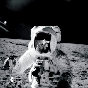 Astronaut Alan Bean holds Special Environmental Sample Container.