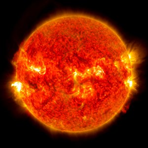 NASA's Solar Dynamics Observatory captured images of the sun emitting a mid-level solar flare. photo