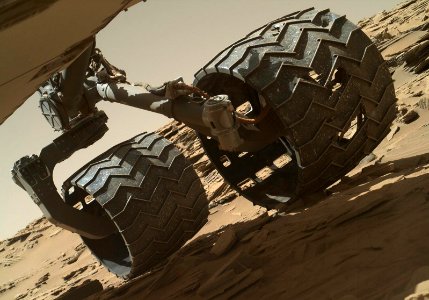 The team operating NASA's Curiosity Mars rover uses the Mars Hand Lens Imager camera on the rover's arm to check the condition of the wheels at routine intervals.