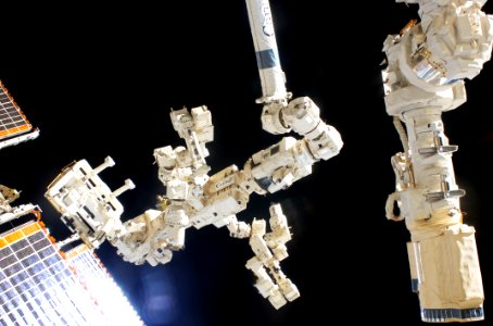 While attached on the end of the Canadarm2, Dextre, the Canadian Space Agency’s robotic “handyman”, is featured in this image photographed by an Expedition 26 crew member aboard the International Space Station. Feb 3rd, 2011.