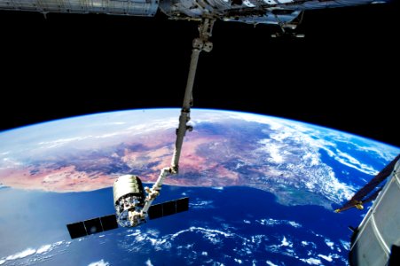 The International Space Station's Canadarm2 prepares to release the Orbital Sciences Corporation's commercial cargo craft. Aug 15th, 2014. photo