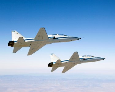 NASA Dryden's two T-38A mission support aircraft fly in tight formation, Sept 26th, 2007. photo