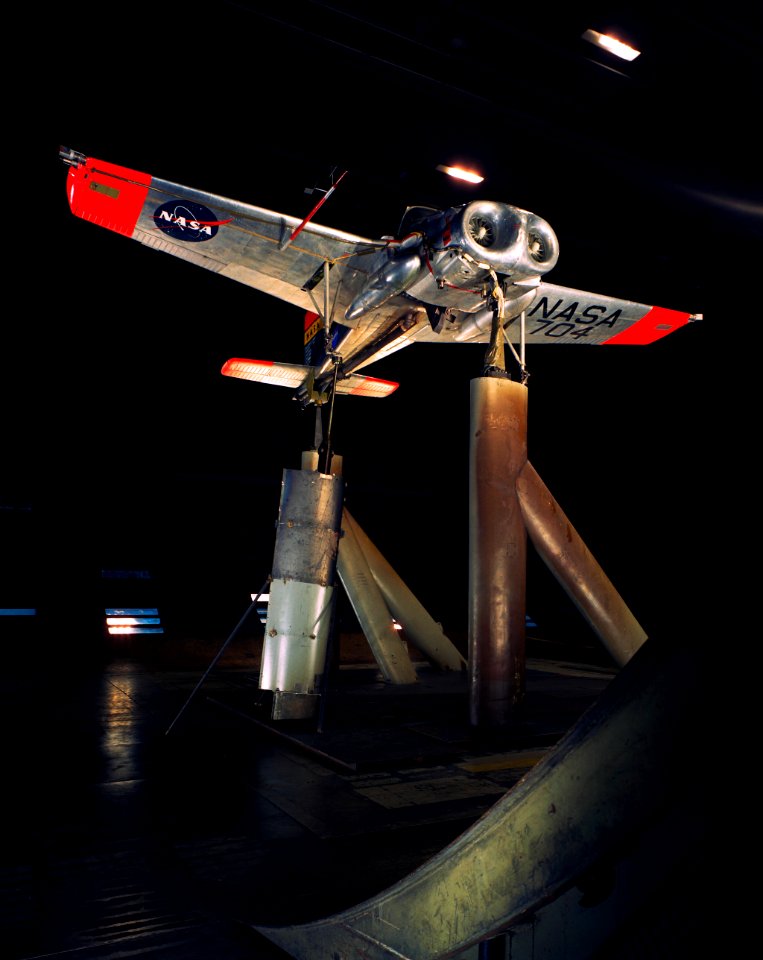 The Bell X-14 NASA 704 Full Scale Airplane tests in 40x80ft. Wind Tunnel (NORMAL MOUNTING) with Sy Sewell, NASA (left) and Ed Varette, Army (right).