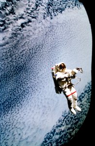 Astronaut Mark C. Lee floats freely as he tests the new Simplified Aid for EVA Rescue (SAFER) system. photo