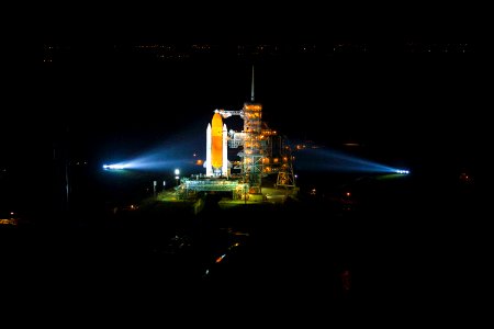 Space shuttle Atlantis, attached to its bright-orange external fuel tank and twin solid rocket boosters on Launch Pad 39A at NASA's Kennedy Space Center in Florida. photo