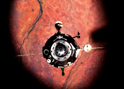 The Soyuz TMA-16 spacecraft is featured in this image photographed by an Expedition 22 crew member on the International Space Station during the relocation of the Soyuz from the Zvezda Service Module’s aft port to the Poisk module. photo