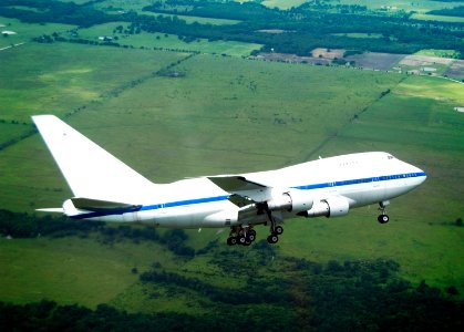 NASA's highly modified Boeing 747SP SOFIA observatory banks low over the Texas countryside as it heads for landing at Waco to conclude its second check flight. May 10, 2007.