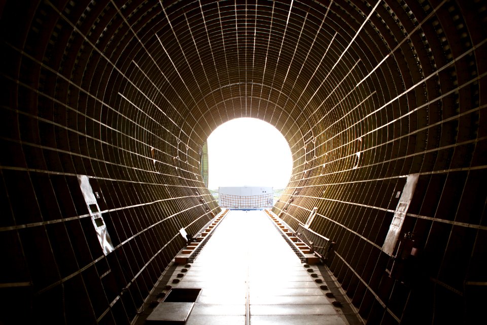 A view from inside the cargo bay of NASA’s Super Guppy aircraft reveals that the shipping container with the Orion heat shield for Exploration Mission 1 (EM-1) was offloaded at the Shuttle Landing Facility, managed and operated by Space Florida, at the agency’s Kennedy Space Center in Florida.