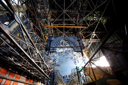 A 250-ton crane is used to lower the second half of the K-level work platforms for NASA’s Space Launch System (SLS) rocket into High Bay 3 inside the Vehicle Assembly Building at NASA's Kennedy Space Center in Florida. photo
