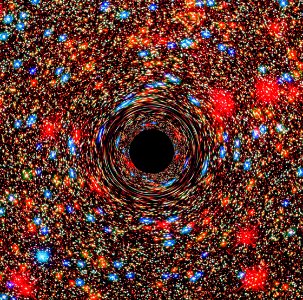 Behemoth Black Hole Found in an Unlikely Place. A supermassive black hole at the core of a galaxy. photo